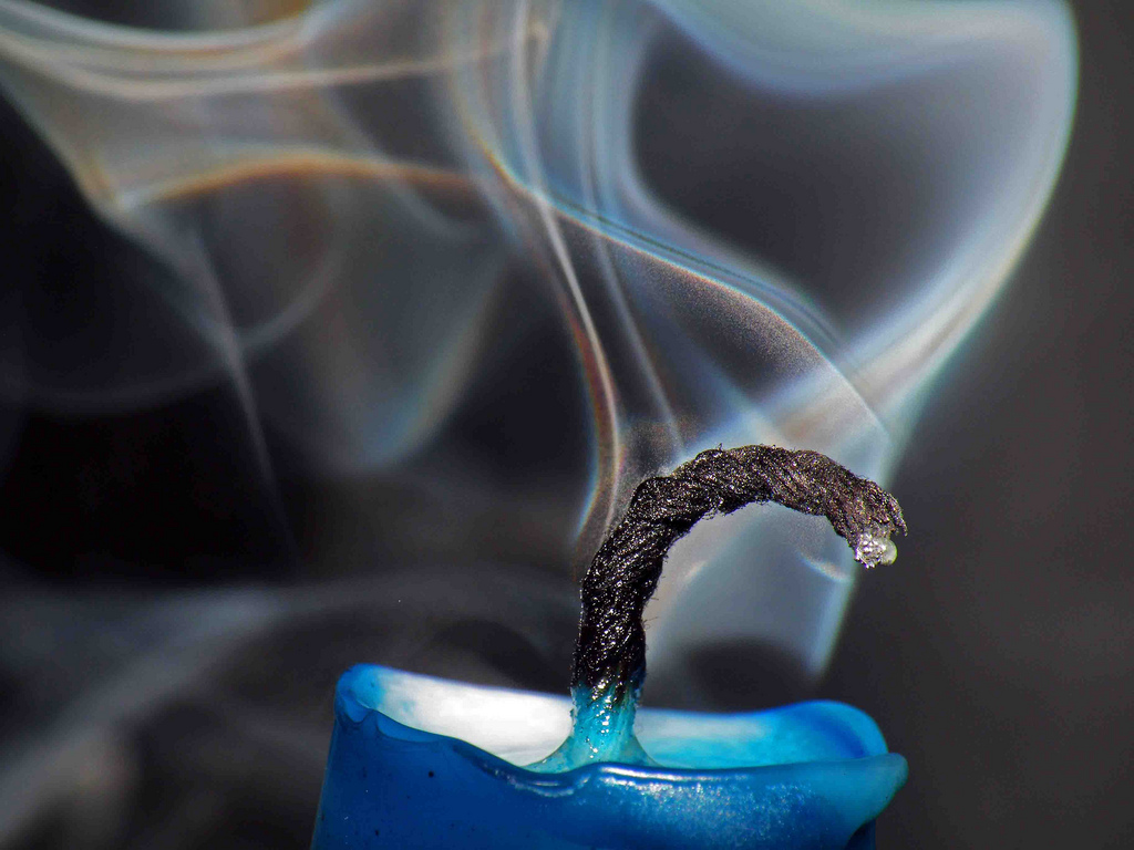 Candle, just after being blown out, smoke trail and waxbow